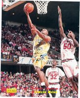 Autographed 8x10 color photo of NBA's TRAVIS BEST
