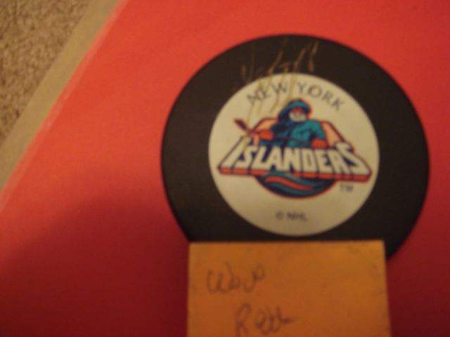 Wade Redden Autographed New York Islanders Fisherman Puck With COA