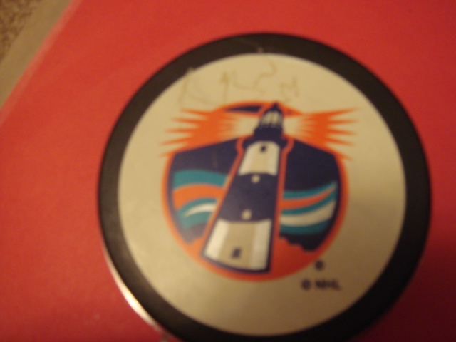 Bryan Berard Autographed Lighthouse Puck with COA