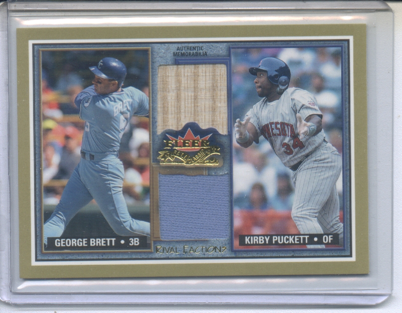 2002 Fleer Fall Classics Rival Factions Game Used Dual #9 George Brett Jsy/Kirby Puckett Bat