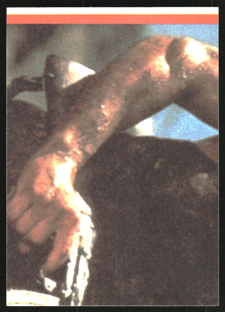 1985 Topps Rambo First Blood Part II Stickers #4 Rambo holding machine gun back image