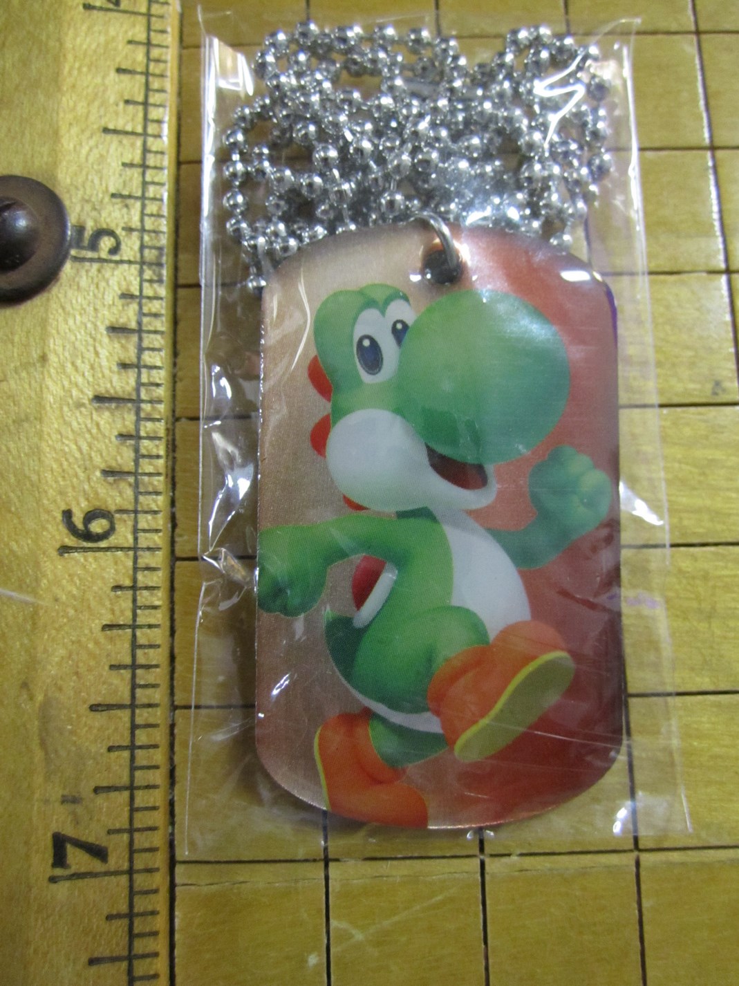 yoshi dog tag