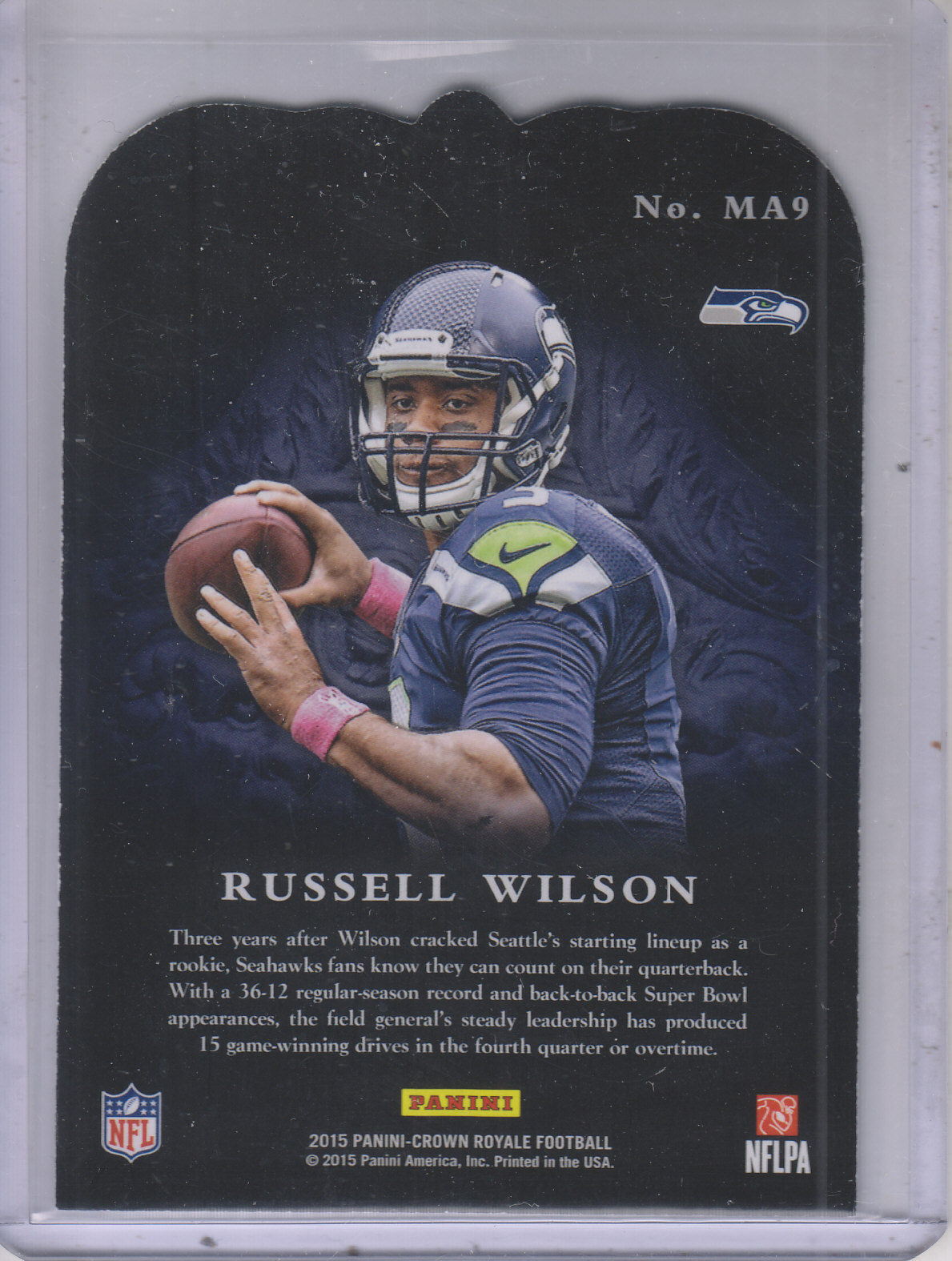 2015 Crown Royale Men at Arms Green #MA9 Russell Wilson back image