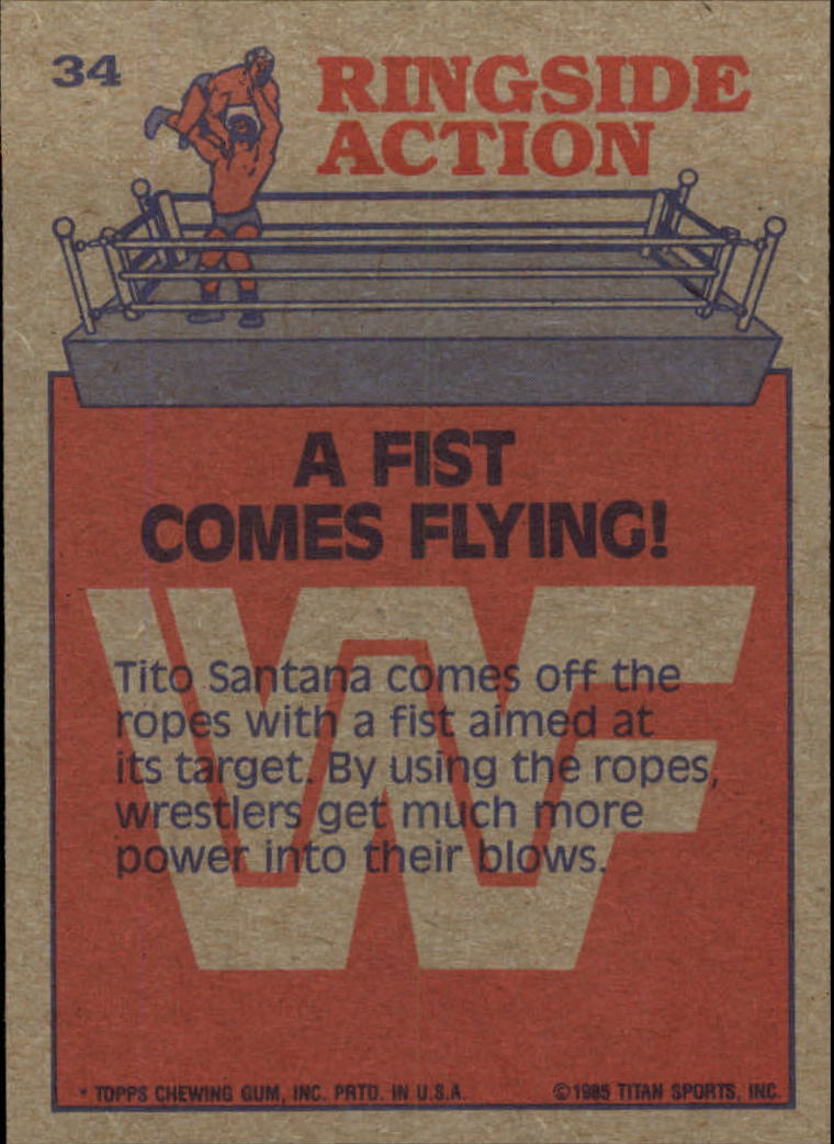 1985 Topps WWF #34 A Fist Comes Flying! RA back image