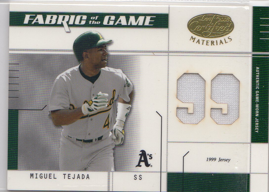 2003 Leaf Certified Materials Fabric of the Game #19JY Miguel Tejada JY/99