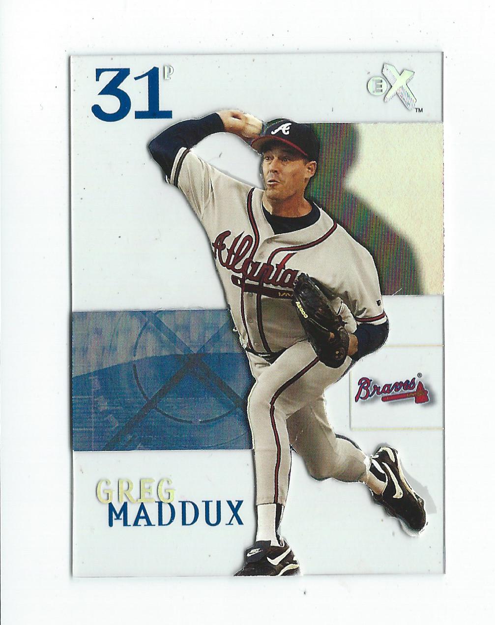 2003 E-X #7 Greg Maddux