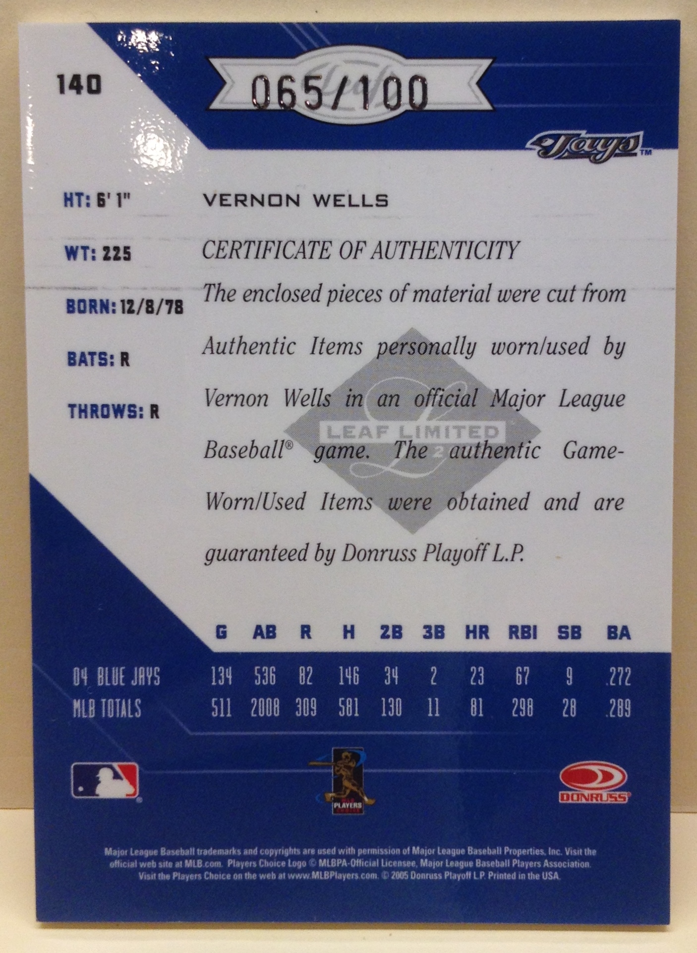 2005 Leaf Limited TNT Prime #140 Vernon Wells Bat-Jsy/100 back image