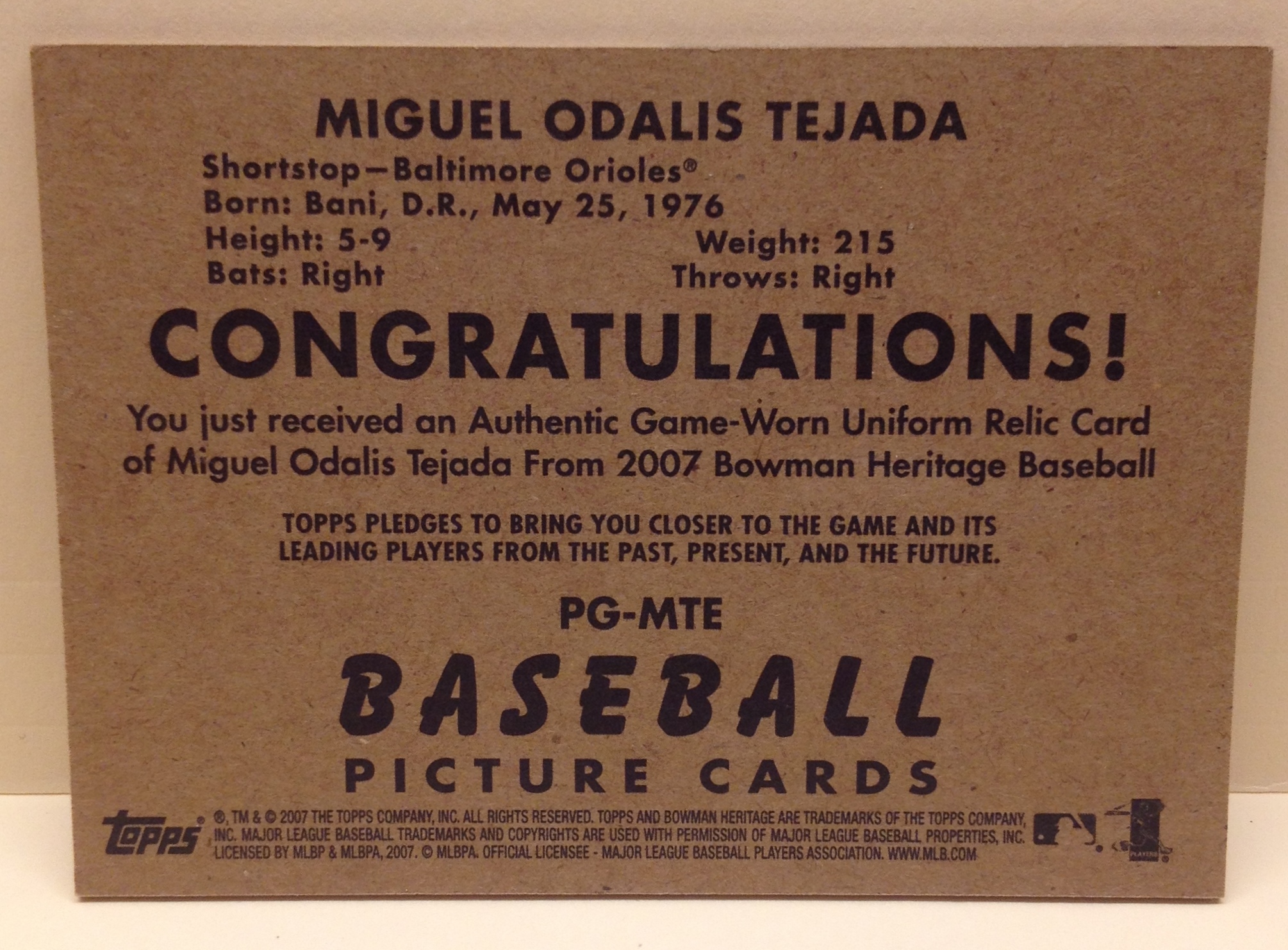 2007 Bowman Heritage Pieces of Greatness #MTE Miguel Tejada Pants B back image