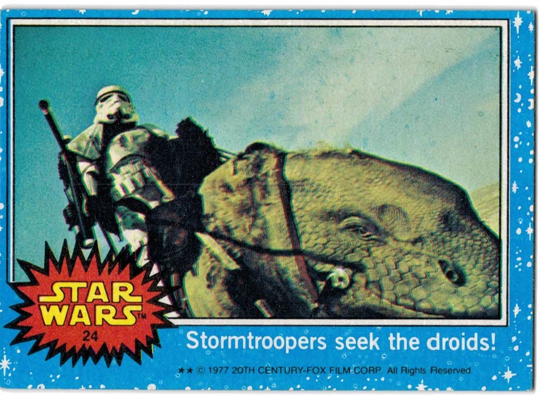 1977 Topps Star Wars #24 Stormtroopers seek the droids