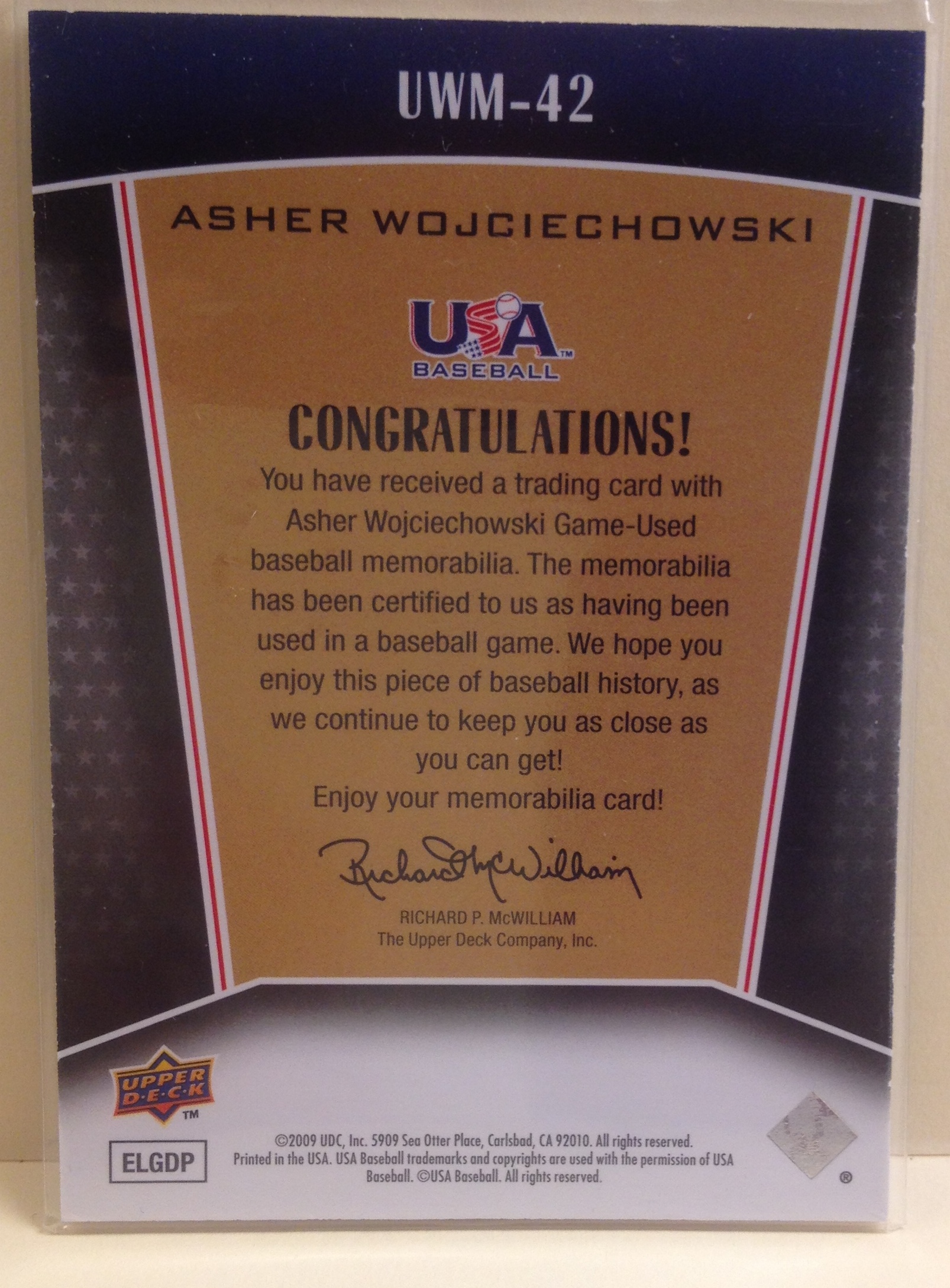 2009 Upper Deck Signature Stars USA Winning Materials #42 Asher Wojciechowski back image