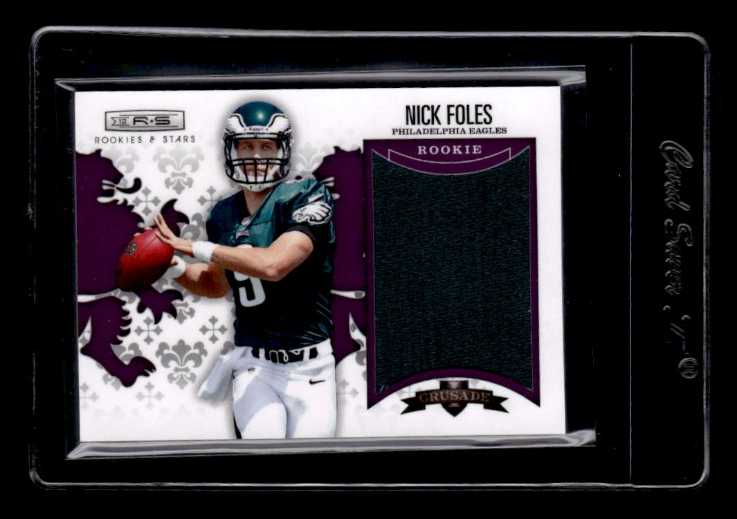 2012 Rookies and Stars Rookie Crusade Materials Purple #14 Nick Foles