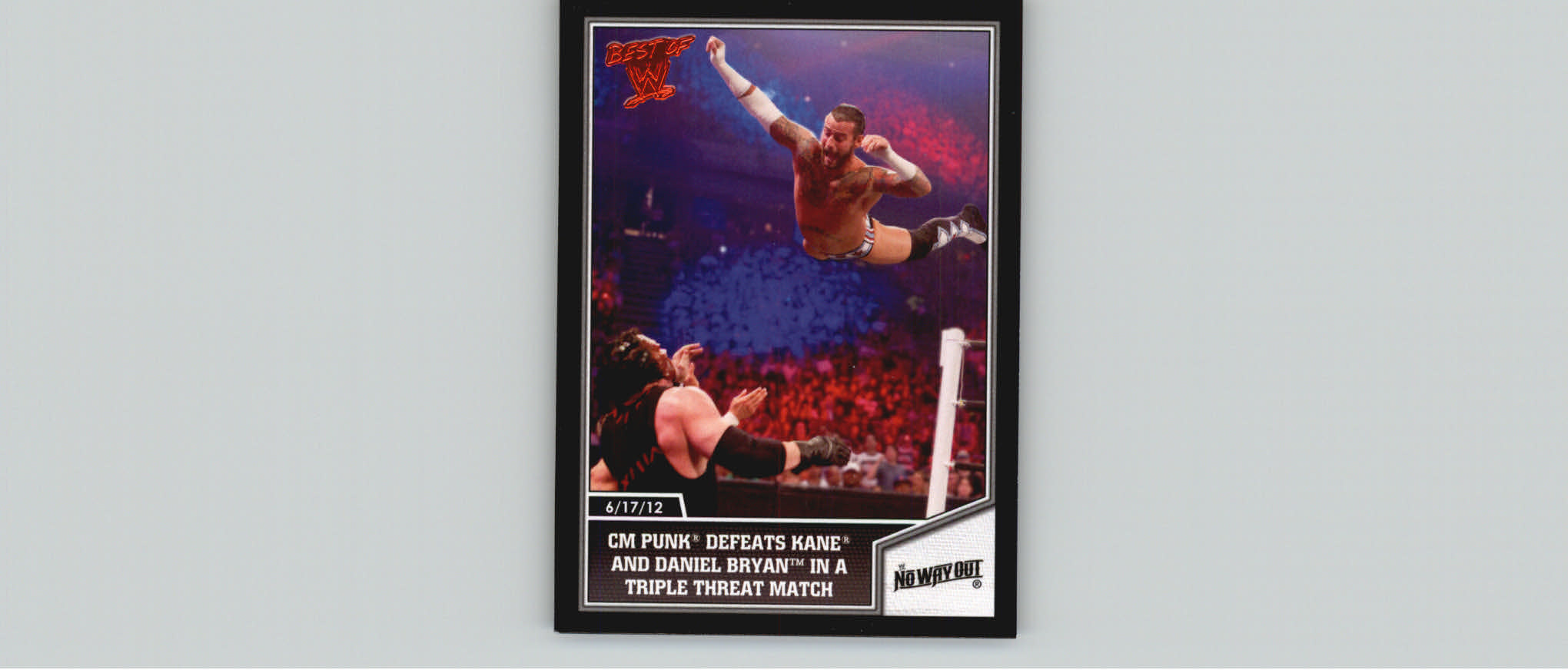 2013 Topps Best of WWE #18 CM Punk Defeats Kane and Daniel Bryan in a Triple Threat Match