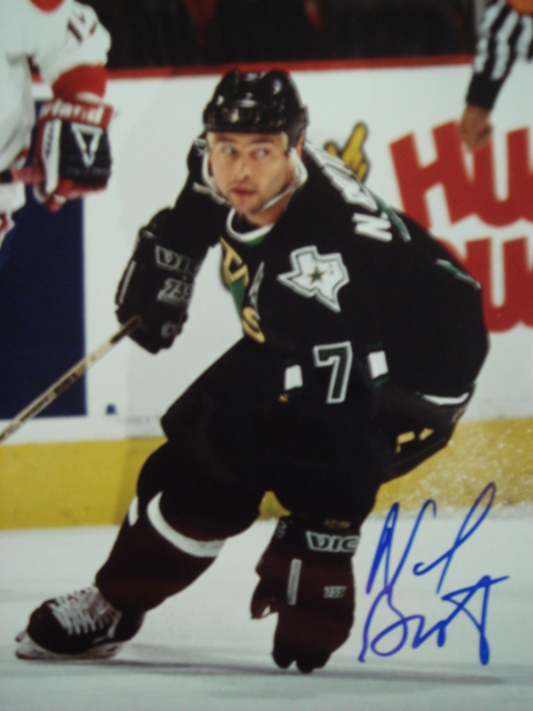 Neal Broten Autographed 8 X 10 Stars picture with coa