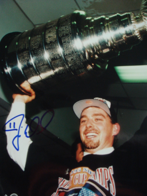 Jim Doud autographed 8 x 10 picture with Coa holding stanley cup
