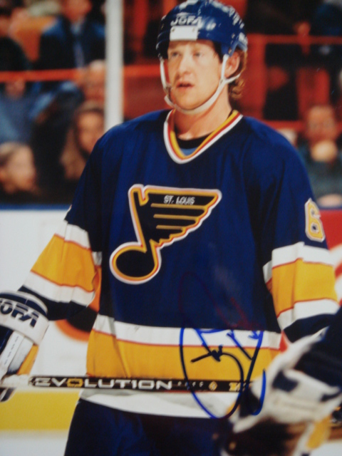 Phil Housley autographed Blues 8 x 10 picture with Coa