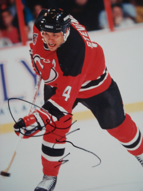 Scott Stevens autographed 8 x 10 Devils picture with coa away jersey taking shot