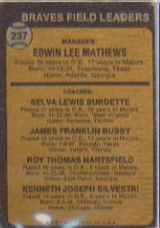 1973 Topps #237A Eddie Mathews MG/Lew Burdette CO/Jim Busby CO/Roy Hartsfield CO/Ken Silvestri CO/Burdette right ear/showing back image