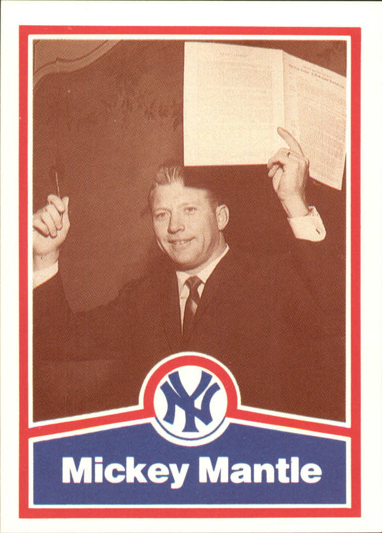 1989 CMC Mantle #7 Holding up his 1962/contract (wearing/suit and t