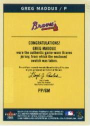 2004 Fleer Platinum Portraits Game Jersey #GM Greg Maddux SP back image