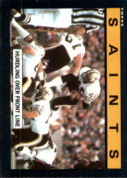 1985 Topps #100 New Orleans Saints TL/Hurdling Over/Front Line