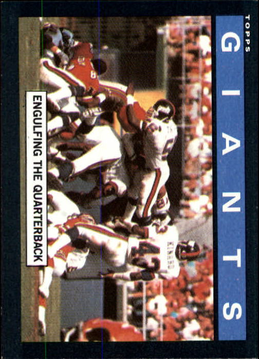 1985 Topps #110 New York Giants TL/Engulfing The/Quarterback/(Giants' Defense)