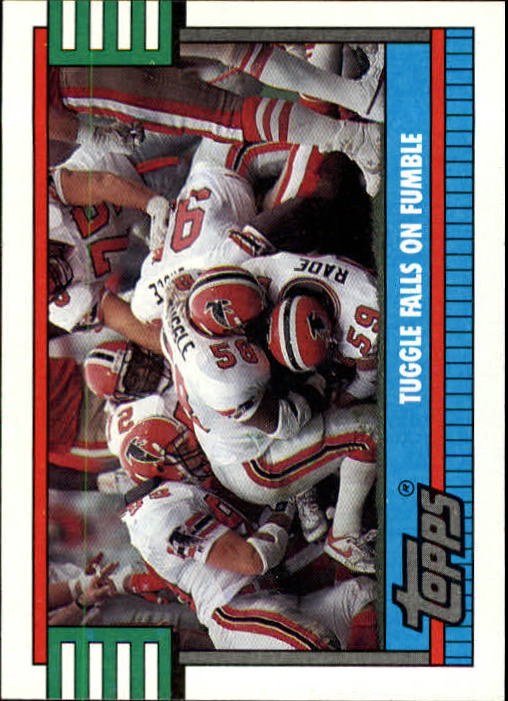 1990 Topps #514A Falcons Team Leaders/(Jessie) Tuggle Falls on Fumble