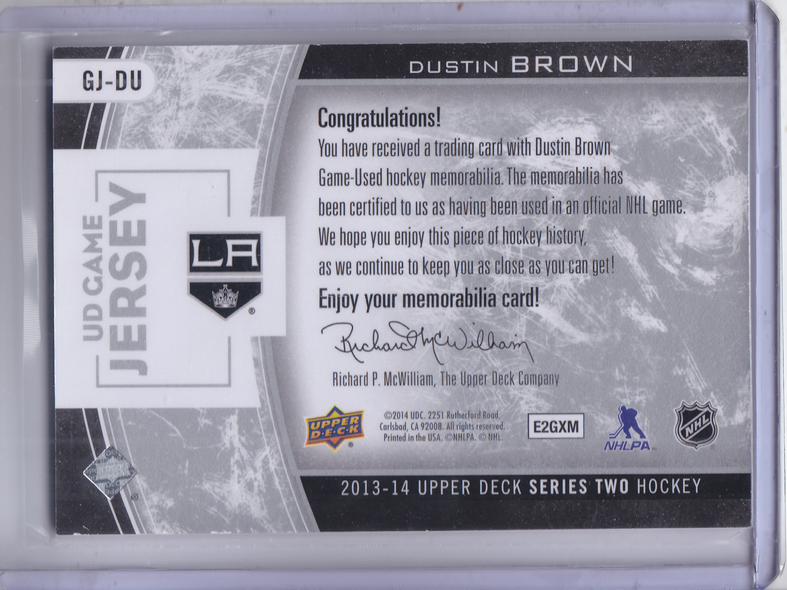 2013-14 Upper Deck Game Jerseys #GJDU Dustin Brown 2C back image