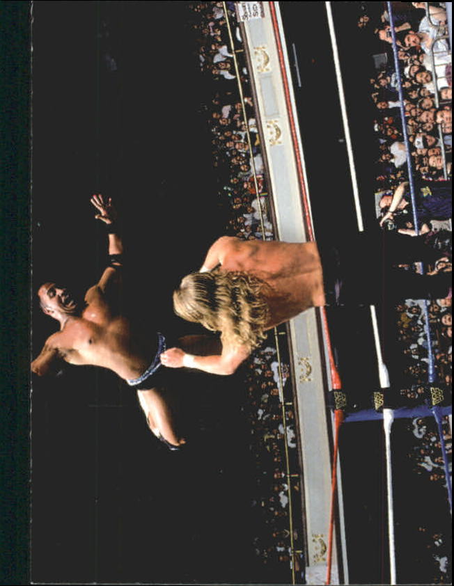 2000 Comic Images WWF Rock Solid #63 Rock vs. Triple H