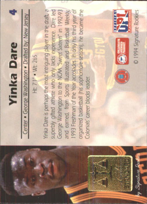 1994 Signature Rookies Gold Standard #4 Yinka Dare back image