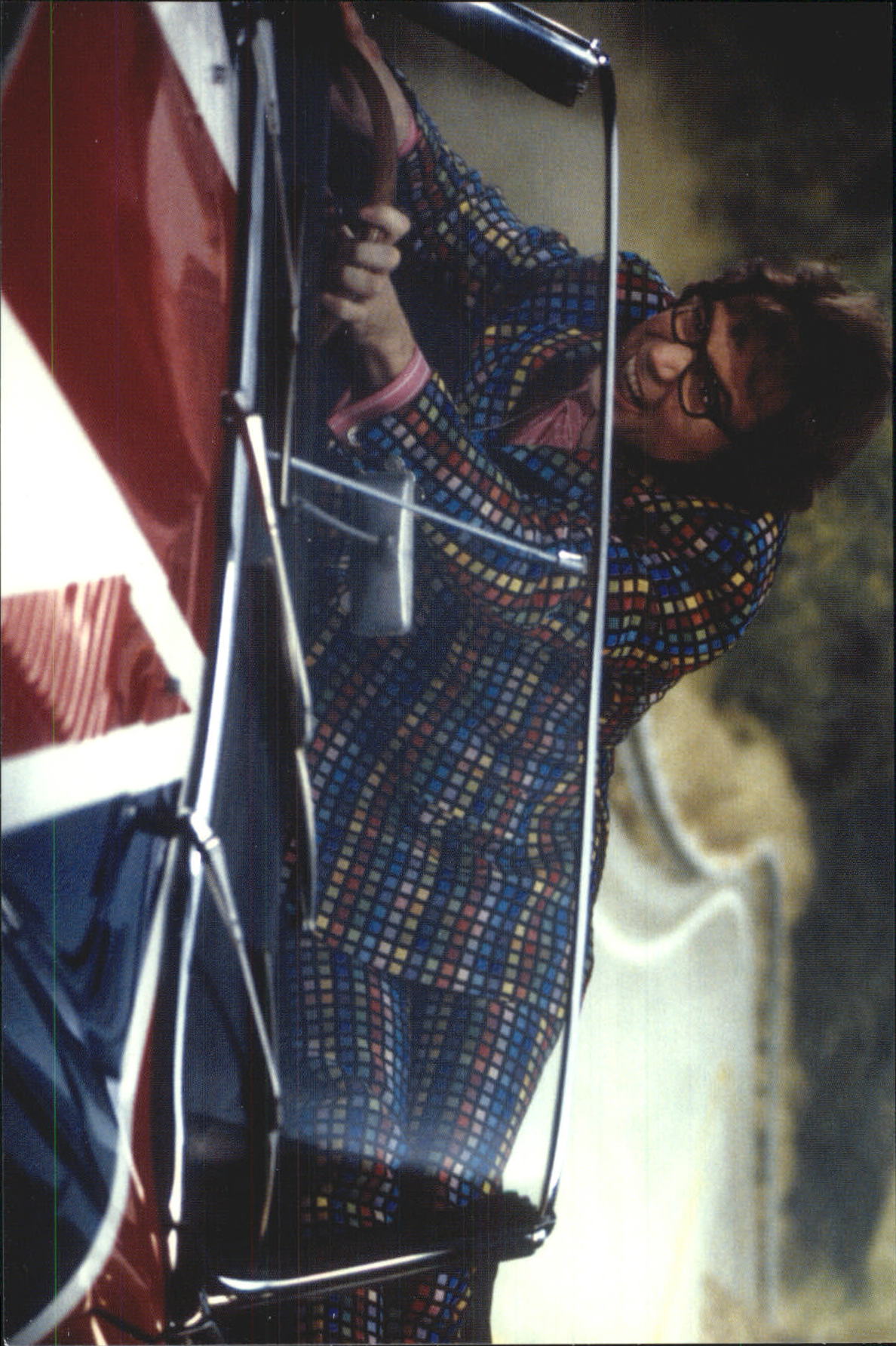 1999 Panini Austin Powers Photocards #49 Austin hangs onto wheel of flag